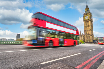 Big Ben and blurry bus in motion. Landmark of London