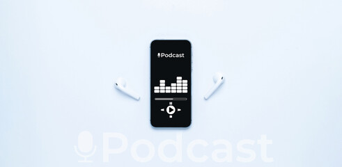 Podcast background. Mobile smartphone screen with podcast application, sound headphones. Audio voice with radio microphone on white. Recording studio or podcasting banner with copy space.
