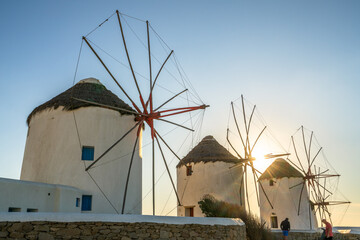 Famous windmills of Mykonos island at sunset, Cyclades in Greece