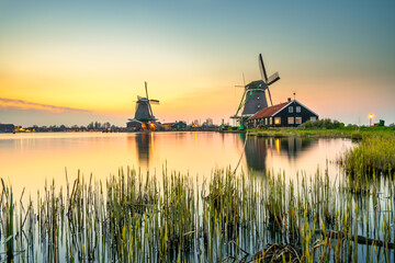 Old Dutch windmill at sunset in Zaanse Schans