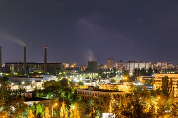 Fototapeta premium Lightning strike over Kiev in purple.