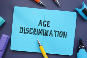 Business concept about Age Discrimination with inscription on the sheet.