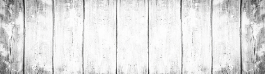 Old white painted exfoliate peeled off rustic bright light shabby wooden board wall texture - wood background banner panorama