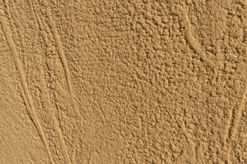 Decorative acrylic sandy plaster texture on wall outside