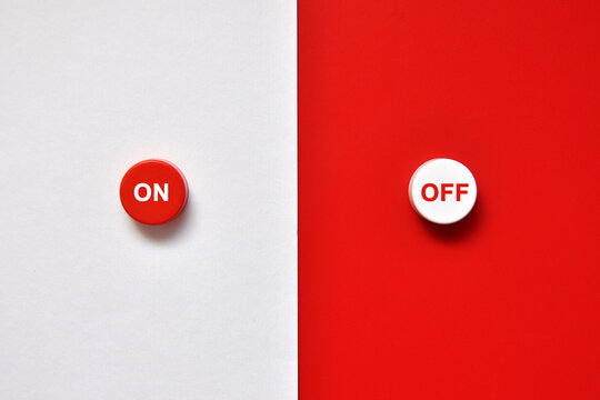 Red and white buttons for turning something on and off.