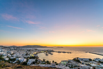 Mykonos panoramic view of sunset over Mykonos port, Mykonos island, Cyclades, Greece