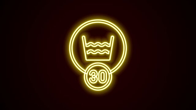 Glowing neon line Washing under 30 degrees celsius icon isolated on black background. Temperature wash. 4K Video motion graphic animation
