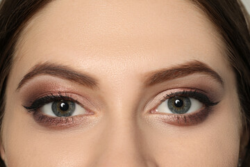 Fototapeta premium Young woman with beautiful eyebrows, closeup view