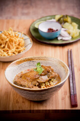 Khao Soi Kai, Northern Style Egg Noodle in Chicken Curry With Ingredients. Thai Food
