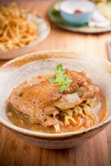 Khao Soi Kai, Northern Style Egg Noodle in Chicken Curry With Ingredients. Thai Food