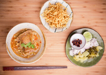 Khao Soi Kai, Northern Style Egg Noodle in Chicken Curry With Ingredients. Thai Food
