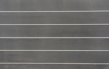 Fototapeta premium Top view of gray asphalt runway