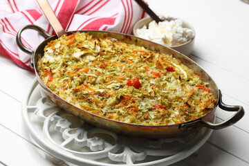Homemade cabbage and bell pepper casserole served with cottage cheese