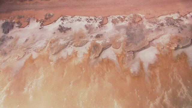 High altitude incredible alien Venus Mars uncharted natural landscape. Unique surface Earth pattern. Epic saline salt mineral pink lake bottom. Impressive Russia Elton Crimea abstract costal scenery