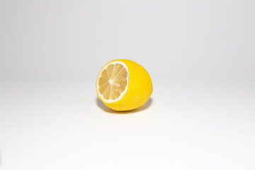 lemon.closeup, cut, ripe, tropical, raw, vitamin, healthy, slice, isolated, white, organic, sour, background, food, half, yellow, fresh, fruit, juicy, citrus