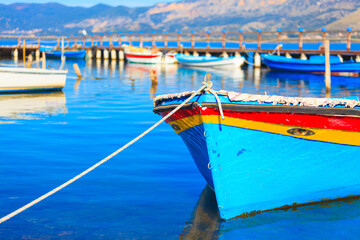 Colorful boat on water, in Aitoliko sea lake in Central Greece - 440222546