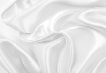 Naklejka premium Smooth elegant white silk or satin luxury cloth texture as wedding background. Luxurious background design