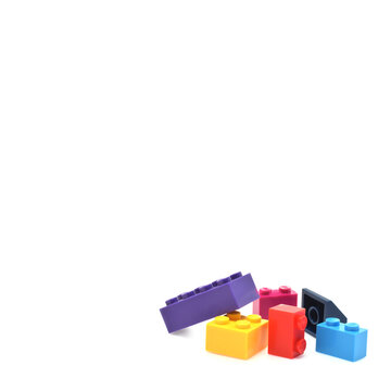 Colorful lego plastic bricks closed up isolated on white