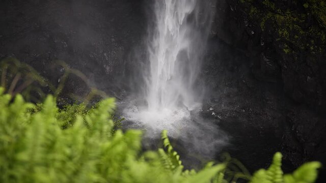 Akaka Falls in Akaka Falls State Park, Big Island of Hawaii. Mid angle, parallax movement, slow motion, HD.