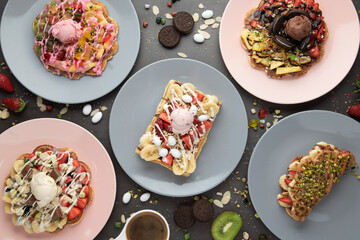 Three different waffles in square, heart and bubble shape.