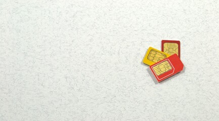 Three colorful SIM cards on the right edge of the photo. Light background