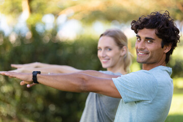 couple jogging and running outdoors in nature