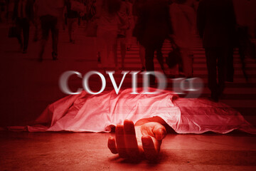 Death person lays on a floor with the word Covid 19
