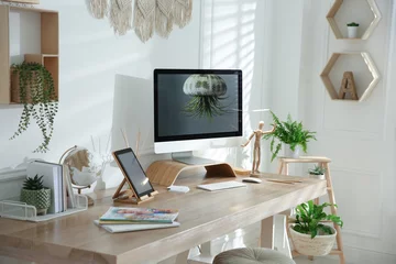 Fotobehang Boho Stylish home office interior with comfortable workplace  © New Africa