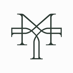 Obraz premium A logo that combines the letters M and T beautifully. They are connected to each other intimately. This logo looks luxurious, classic but also modern.