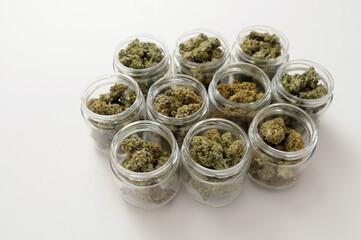 Cannabis drying and curing. Marijuana buds in glass jars. Eco container. Hemp growing concept.