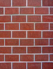 Close up of classic red shiner bond brick wall. It is the simplest repeating pattern for using as background and texture.