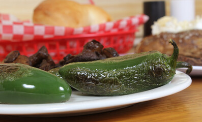 Roasted Green Jalapeno Peppers With Mushrooms in Rural Cafe