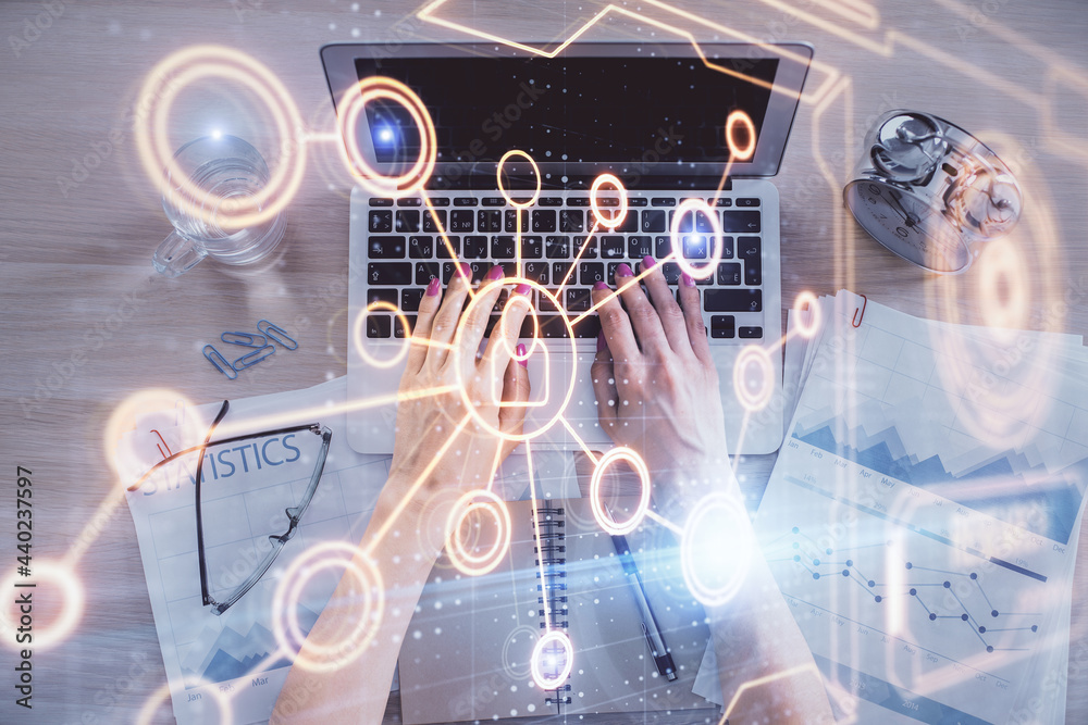 Poster double exposure of woman hands working on computer and social network theme hologram drawing. top vi