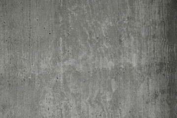 texture a concrete wall with exposed air bubbles on it