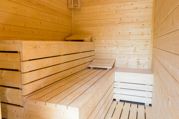 Empty sauna, boards, wooden seats private home spa