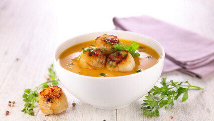 soup with seared scallop and herbs