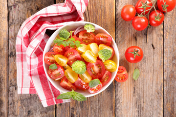 bowl of tomato salad with basil