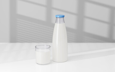 glass and bottle of milk on a table
