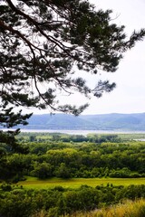 View from the hill to the mountains and the river