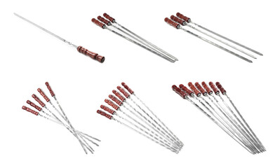 Set with metal skewers on white background
