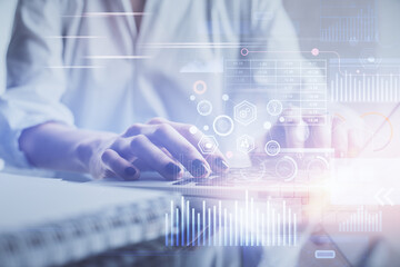 Double exposure of woman hands working on computer and data theme hologram drawing. Tech concept.