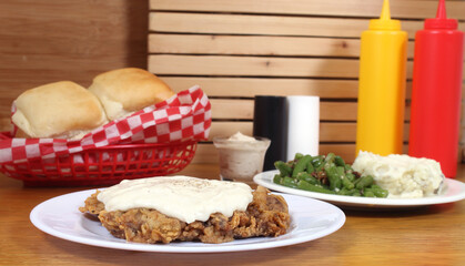 Chicken Fried Steak and Gravy With Mashed Potatoes in Rural Cafe Restaurant
