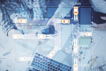 Double exposure of automobile theme hologram and man and woman working together holding and using a mobile device.