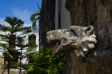 Close-up shot of Gargoyle statue from the colonial era in a park of Santo Domingo