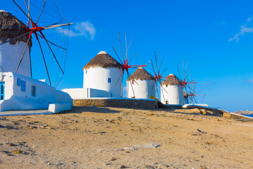 Windmills view  in row closeup with deep blue sky in Mykonos island cyclades Greece - 440253551