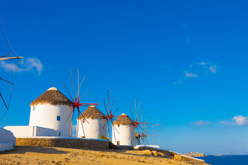 Windmills view  with sea background Mykonos island cyclades Greece - 440253584