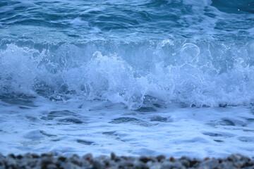 Waves on a beach in Croatia. Selective focus.