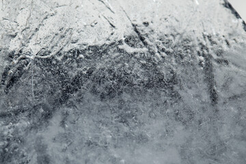 Ice texture with small round air bubbles trapped inside 