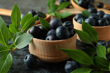 Fresh berry concept with blueberry on black smokey table