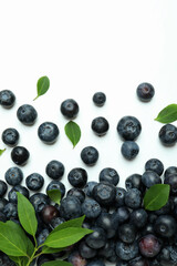 Fresh blueberry with leaves on white background